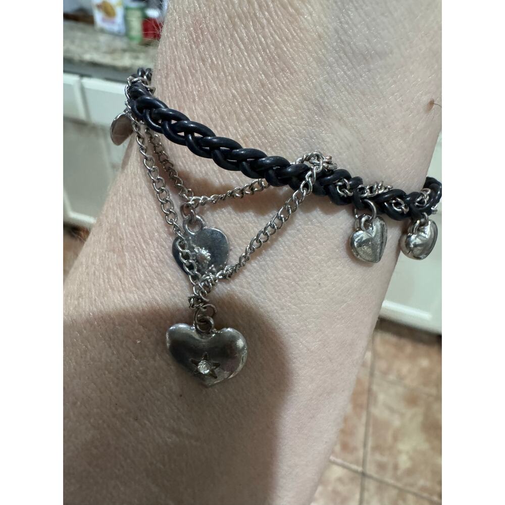 You and I leather and silver tone charm bracelet provides